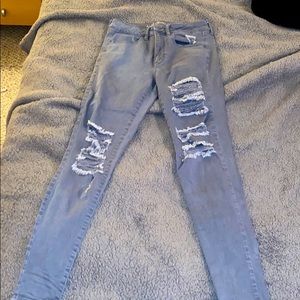 Grey distressed super stretch high rise jegging